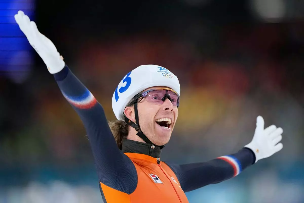 Gold medallist Jorrit Bergsma of the Netherlands celebrates winning the men's mass start final speedskating race at the 2026 Winter Olympics, in Milan, Italy, Saturday, Feb. 21, 2026. (AP Photo/Ben Curtis)
