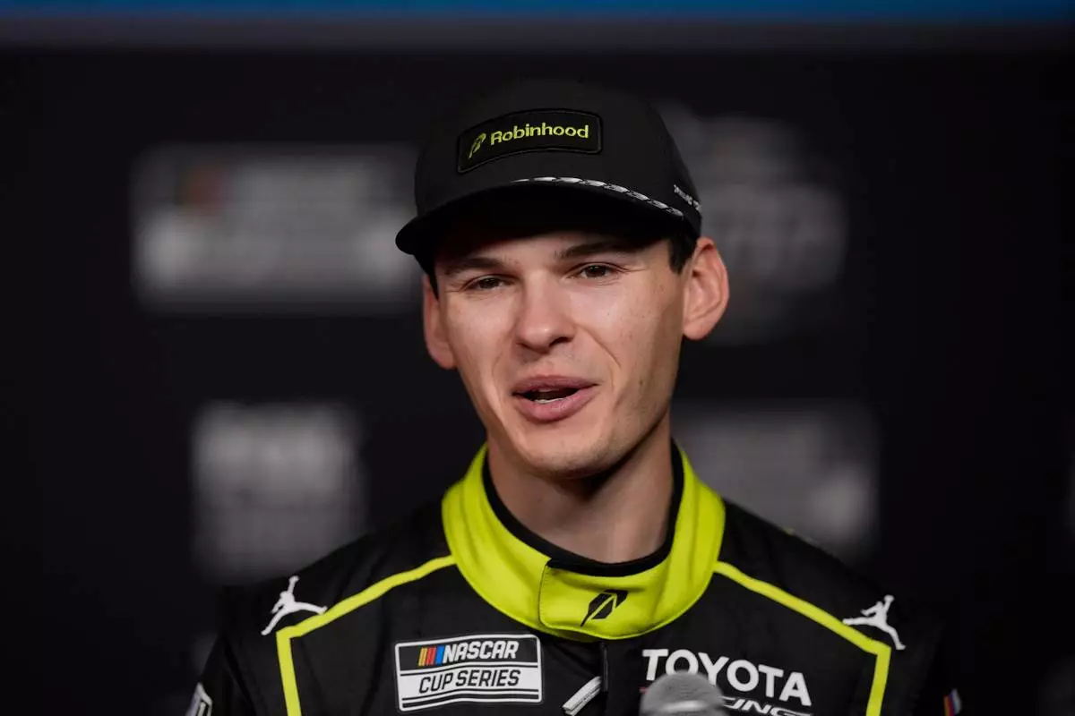 Corey Heim speaks during a NASCAR Daytona 500 media day, Wednesday, Feb. 11, 2026, in Daytona, Fla. (AP Photo/Mike Stewart)