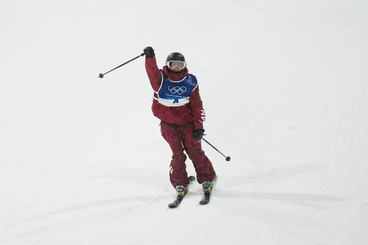 Canada's Megan Oldham reacts during the women's freestyle skiing big air finals at the 2026 Winter Olympics, in Livigno, Italy, Monday, Feb. 16, 2026. (AP Photo/Lindsey Wasson)