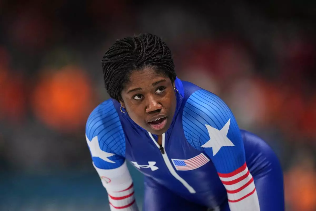 Fifth placed Erin Jackson of the U.S. catches her breath after competing in the women's 500 meters speedskating race at the 2026 Winter Olympics, in Milan, Italy, Sunday, Feb. 15, 2026. (AP Photo/Antonio Calanni)