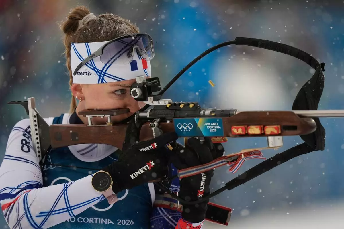 Oceane Michelon, of France, competes in the women's 12.5-kilometer mass start biathlon race at the 2026 Winter Olympics in Anterselva, Italy, Saturday, Feb. 21, 2026. (AP Photo/Andrew Medichini)
