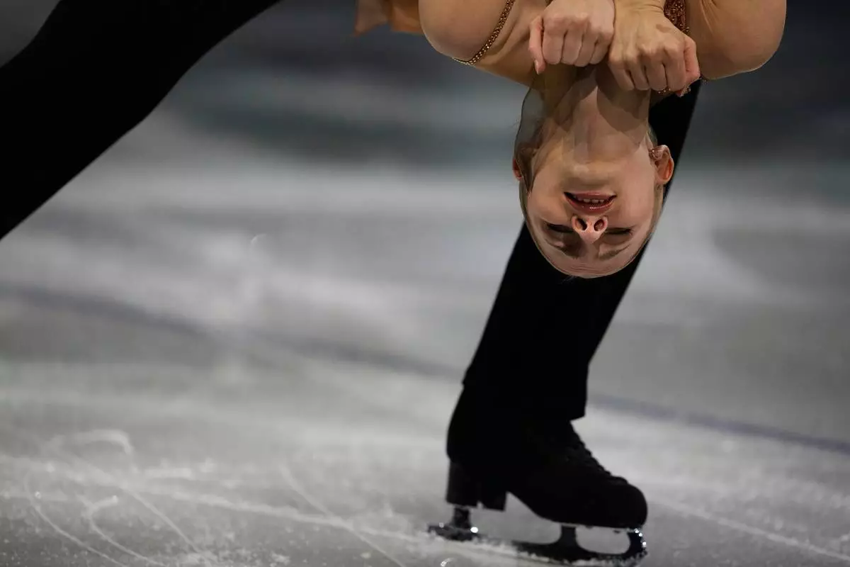 Fabienne Hase Minerva and Nikita Volodin of Germany perform during the figure skating exhibition at the 2026 Winter Olympics, in Milan, Italy, Saturday, Feb. 21, 2026. (AP Photo/Ashley Landis)