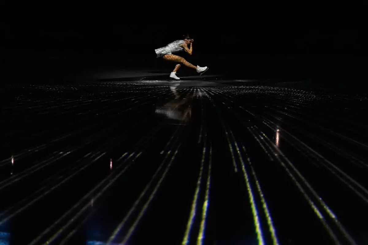 Carolina Kostner performs during the figure skating exhibition at the 2026 Winter Olympics, in Milan, Italy, Saturday, Feb. 21, 2026. (AP Photo/Ashley Landis)