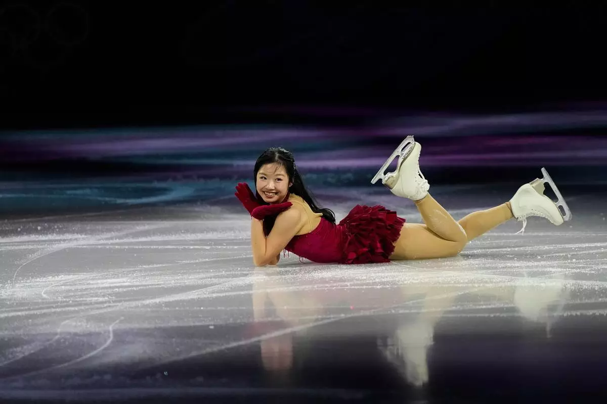 Ami Nakai of Japan performs during the figure skating exhibition at the 2026 Winter Olympics, in Milan, Italy, Saturday, Feb. 21, 2026. (AP Photo/Ashley Landis)