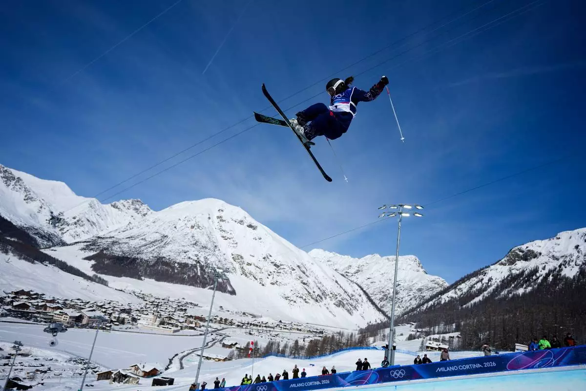 Britain's Zoe Atkin competes during the women's freestyle skiing halfpipe final at the 2026 Winter Olympics, in Livigno, Italy, Sunday, Feb. 22, 2026. (AP Photo/Julia Demaree Nikhinson)