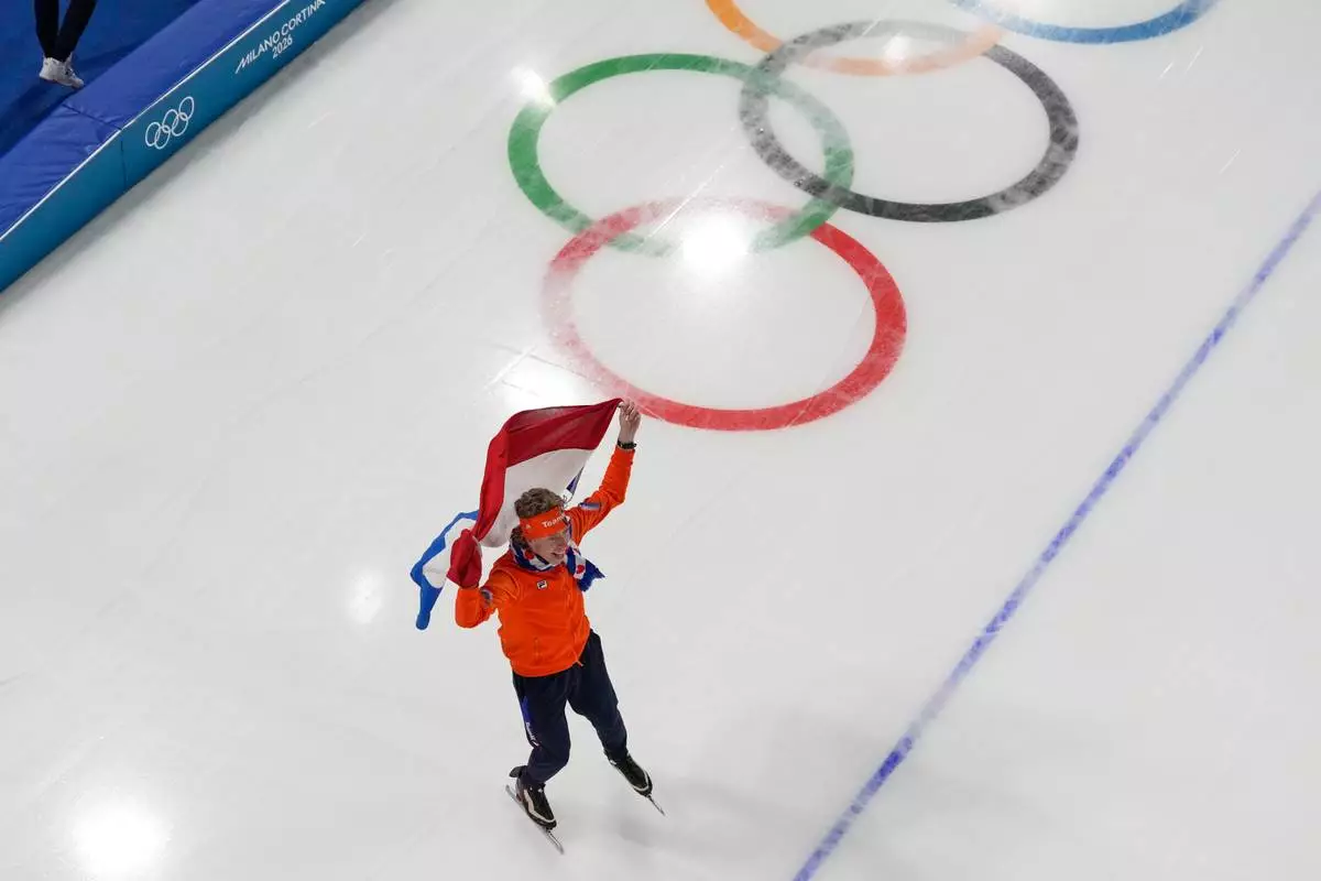 Netherlands' Jorrit Bergsma celebrates after winning bronze in the men's 10,000-meters speedskating final at the 2026 Winter Olympics, in Milan, Italy, Friday, Feb. 13, 2026. (AP Photo/David J. Phillip)