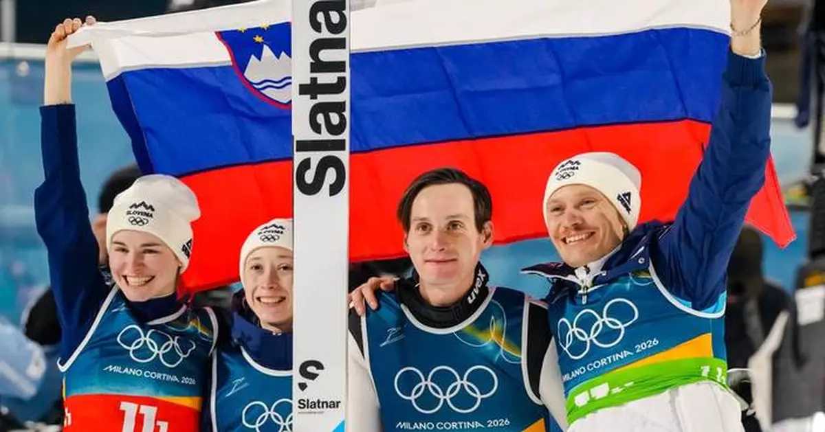 Slovenian siblings Domen and Nika Prevc win Olympic gold in ski jumping team event