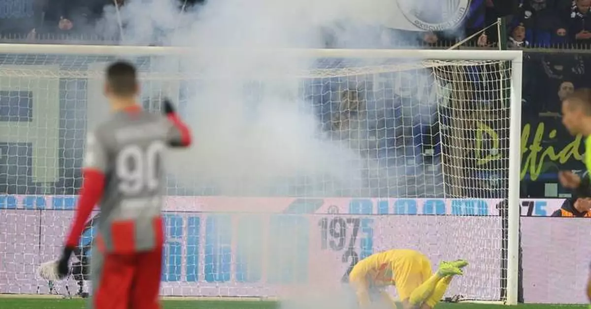 Inter Milan match briefly halted after flare hits Cremonese goalkeeper