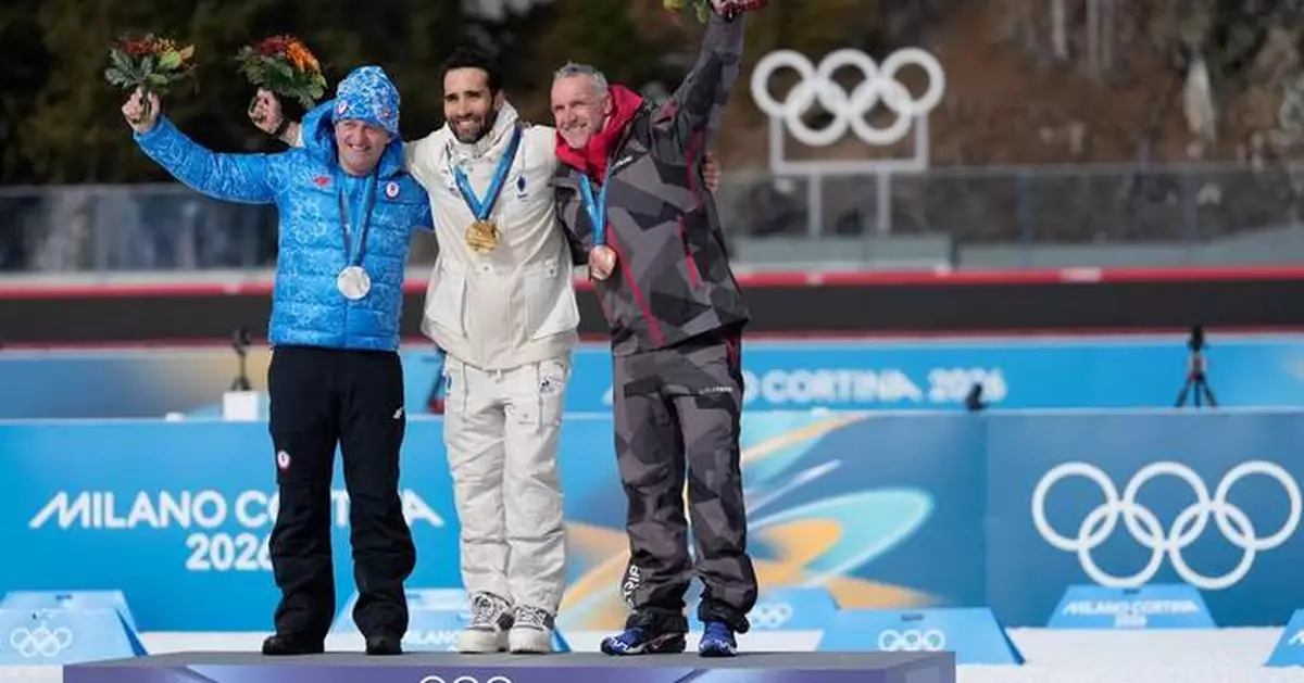 France's Martin Fourcade, German biathlon relay team receive gold medals in reallocation ceremony