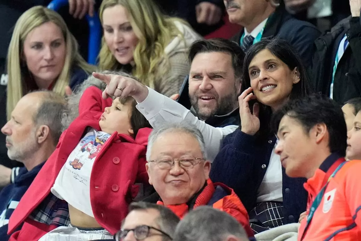 Vice President JD Vance, center, and his wife Usha Vance attend the figure skating ice dance team event at the 2026 Winter Olympics, in Milan, Italy, Friday, Feb. 6, 2026. (AP Photo/Francisco Seco)