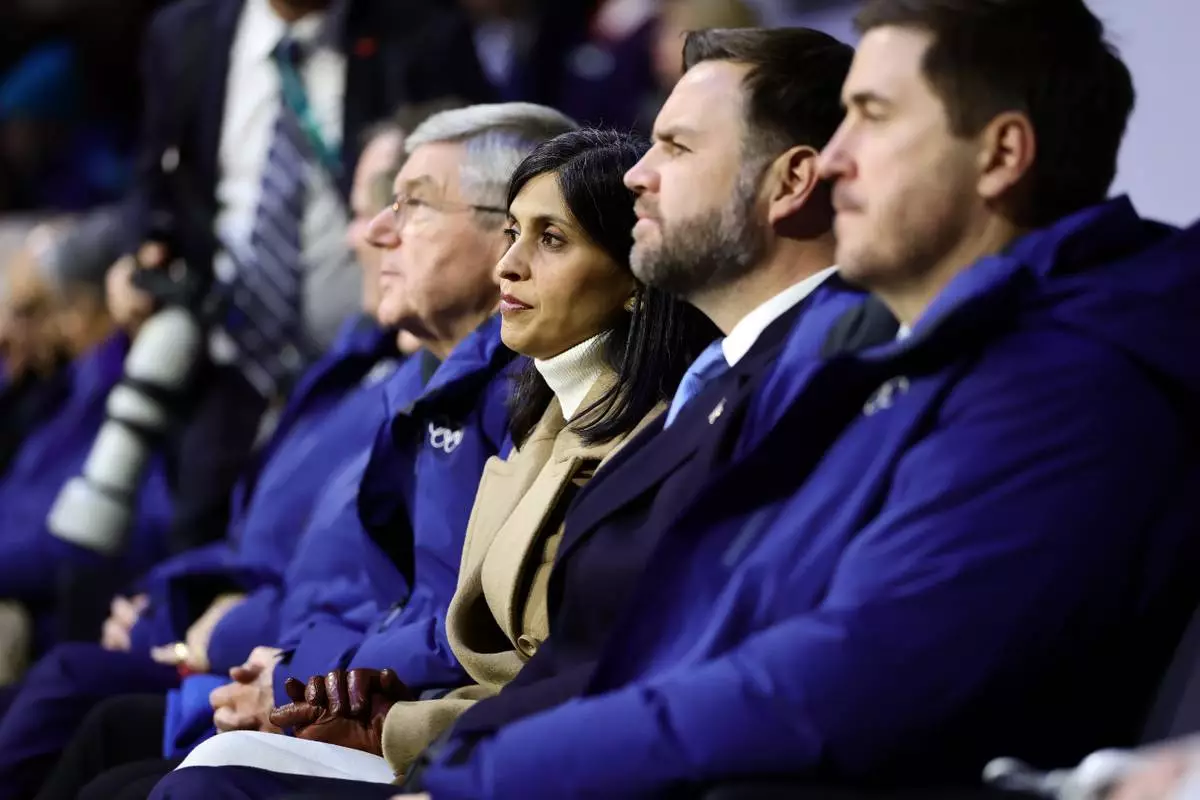 US Vice President JD Vance, center right, and second lady Usha Vance attend the Olympic opening ceremony at the 2026 Winter Olympics, in Milan, Italy, Friday, Feb. 6, 2026. (Andreas Rentz/Pool Photo via AP)
