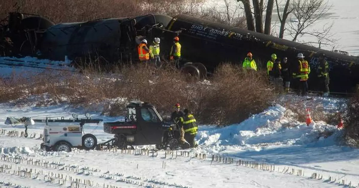 Freight train derails in Connecticut, sending cars carrying liquid propane into river