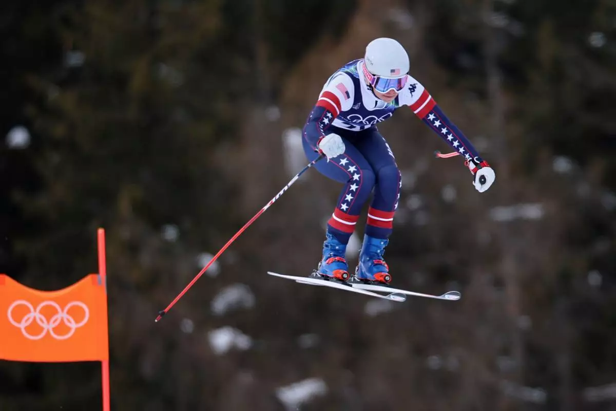 United States' Jacqueline Wiles speeds down the course during an alpine ski, women's downhill official training, at the 2026 Winter Olympics, in Cortina d'Ampezzo, Italy, Friday, Feb. 6, 2026. (AP Photo/Marco Trovati)