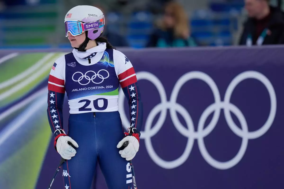 United States' Jacqueline Wiles at the finish area during an alpine ski, women's downhill official training, at the 2026 Winter Olympics, in Cortina d'Ampezzo, Italy, Friday, Feb. 6, 2026. (AP Photo/Giovanni Auletta)