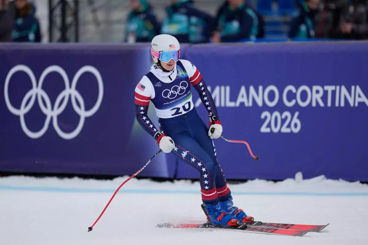 United States' Jacqueline Wiles at the finish area during an alpine ski, women's downhill official training, at the 2026 Winter Olympics, in Cortina d'Ampezzo, Italy, Friday, Feb. 6, 2026. (AP Photo/Giovanni Auletta)