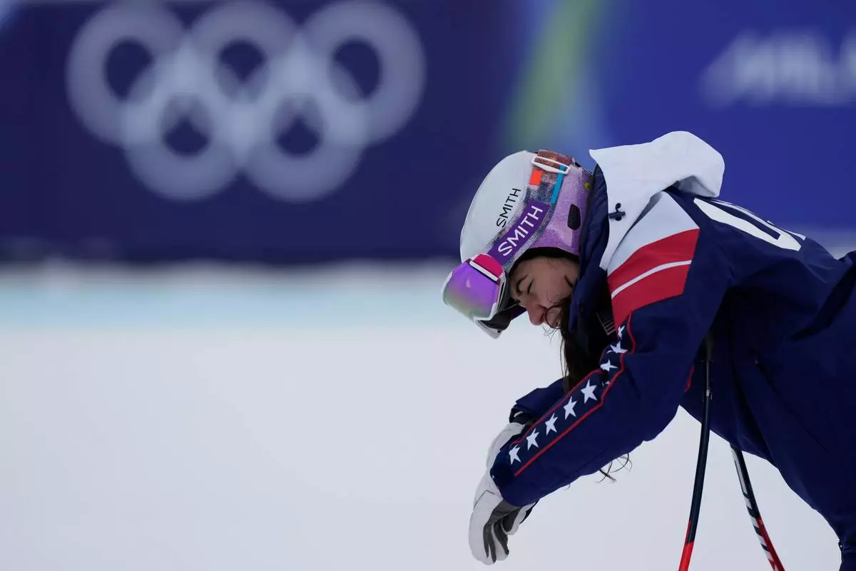United States' Jacqueline Wiles concentrates during a race inspection ahead of an alpine ski, women's downhill official training, at the 2026 Winter Olympics, in Cortina d'Ampezzo, Italy, Friday, Feb. 6, 2026. (AP Photo/Giovanni Auletta)