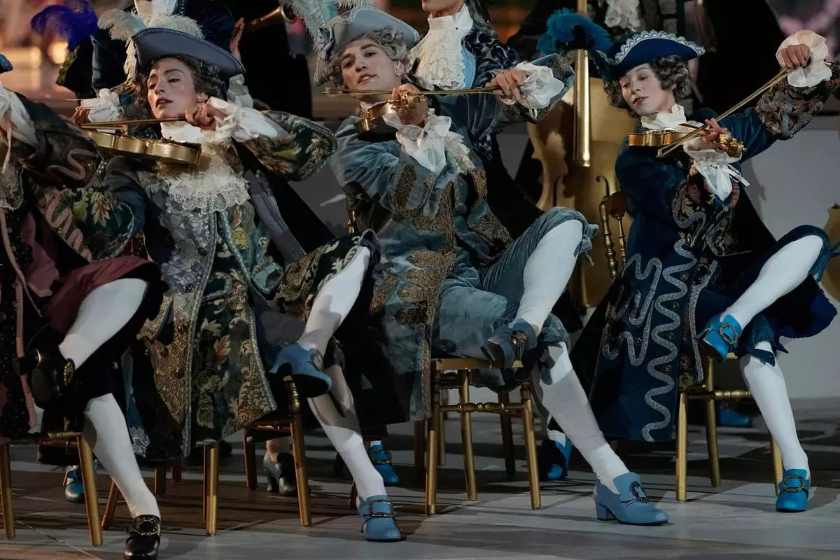 Performers participate in the closing ceremony of the 2026 Winter Olympics, in Verona, Italy, Sunday, Feb. 22, 2026. (AP Photo/Natacha Pisarenko)