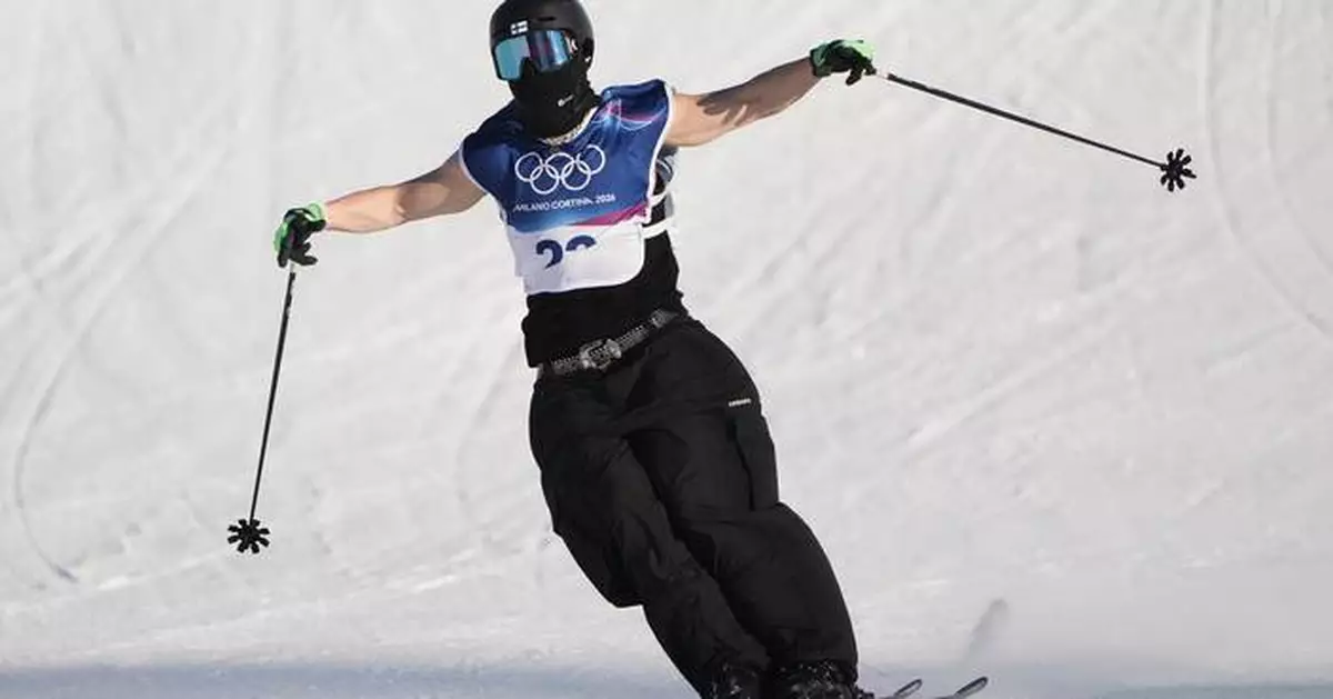 Olympic slopestyler shows some skin, skis down the mountain in a tank top