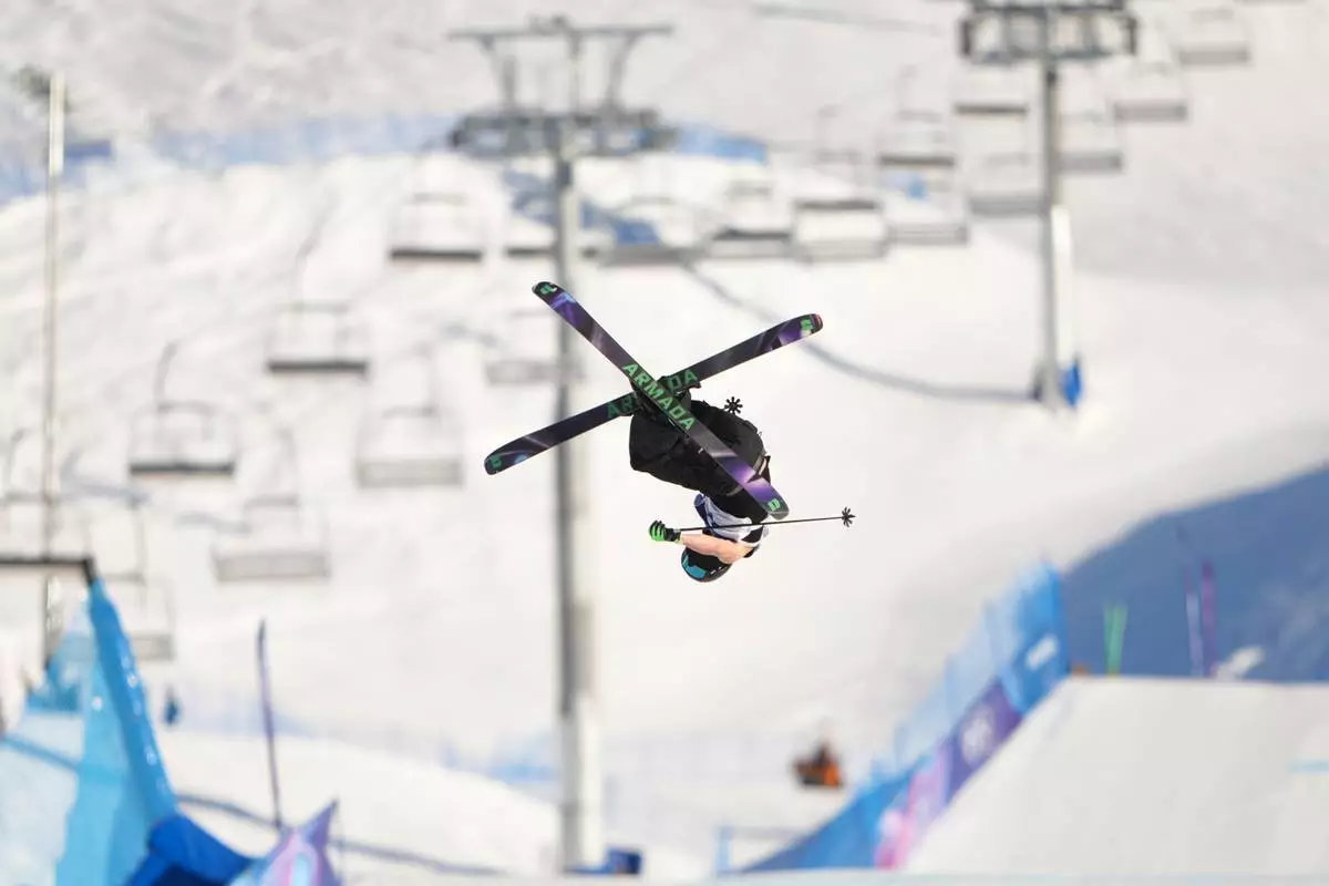Finland's Kuura Koivisto competes during men's freestyle skiing slopestyle qualifications at the 2026 Winter Olympics, in Livigno, Italy, Saturday, Feb. 7, 2026. (AP Photo/Lindsey Wasson)