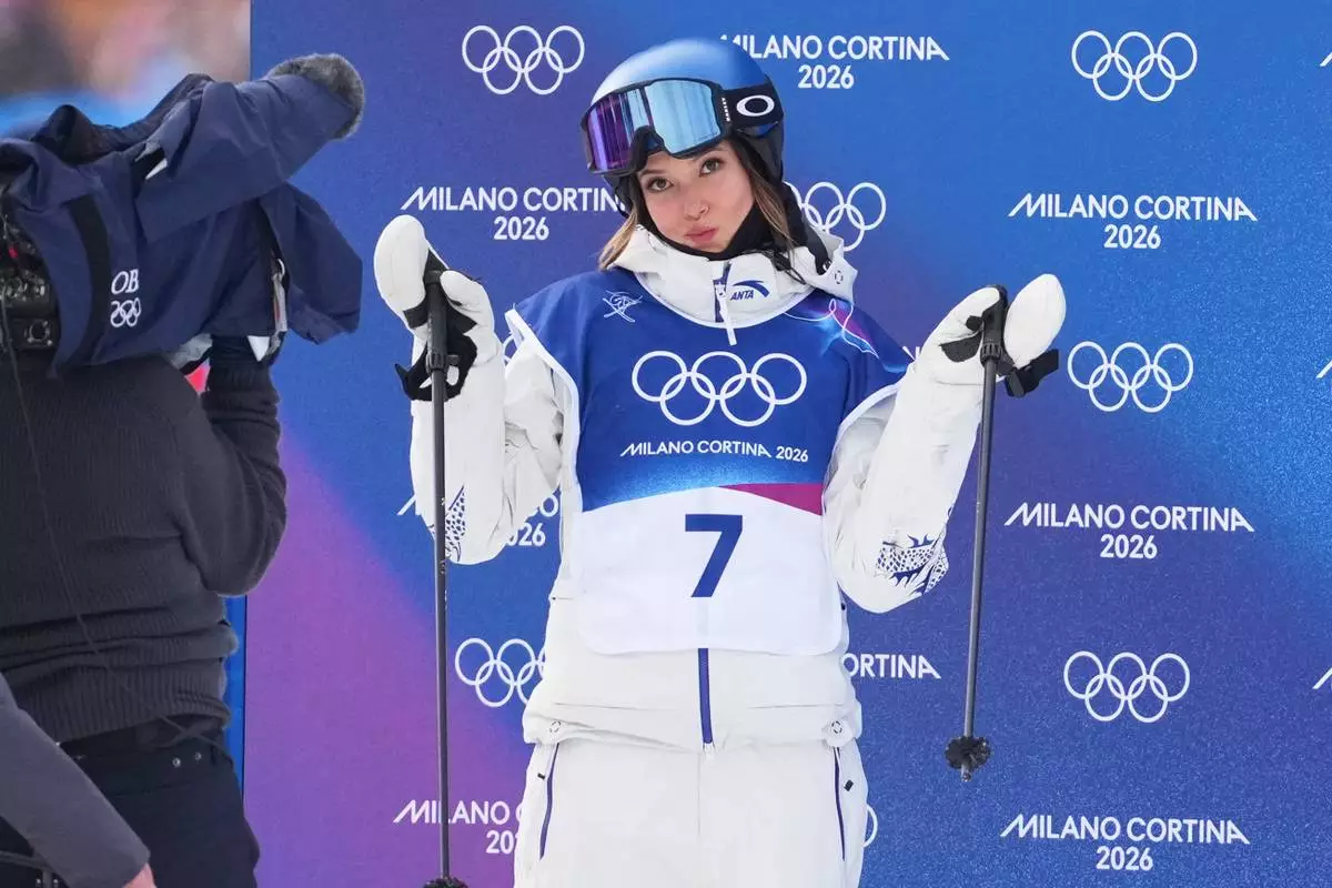 China's Eileen Gu reacts during the women's freestyle skiing slopestyle finals at the 2026 Winter Olympics, in Livigno, Italy, Monday, Feb. 9, 2026. (AP Photo/Lindsey Wasson)