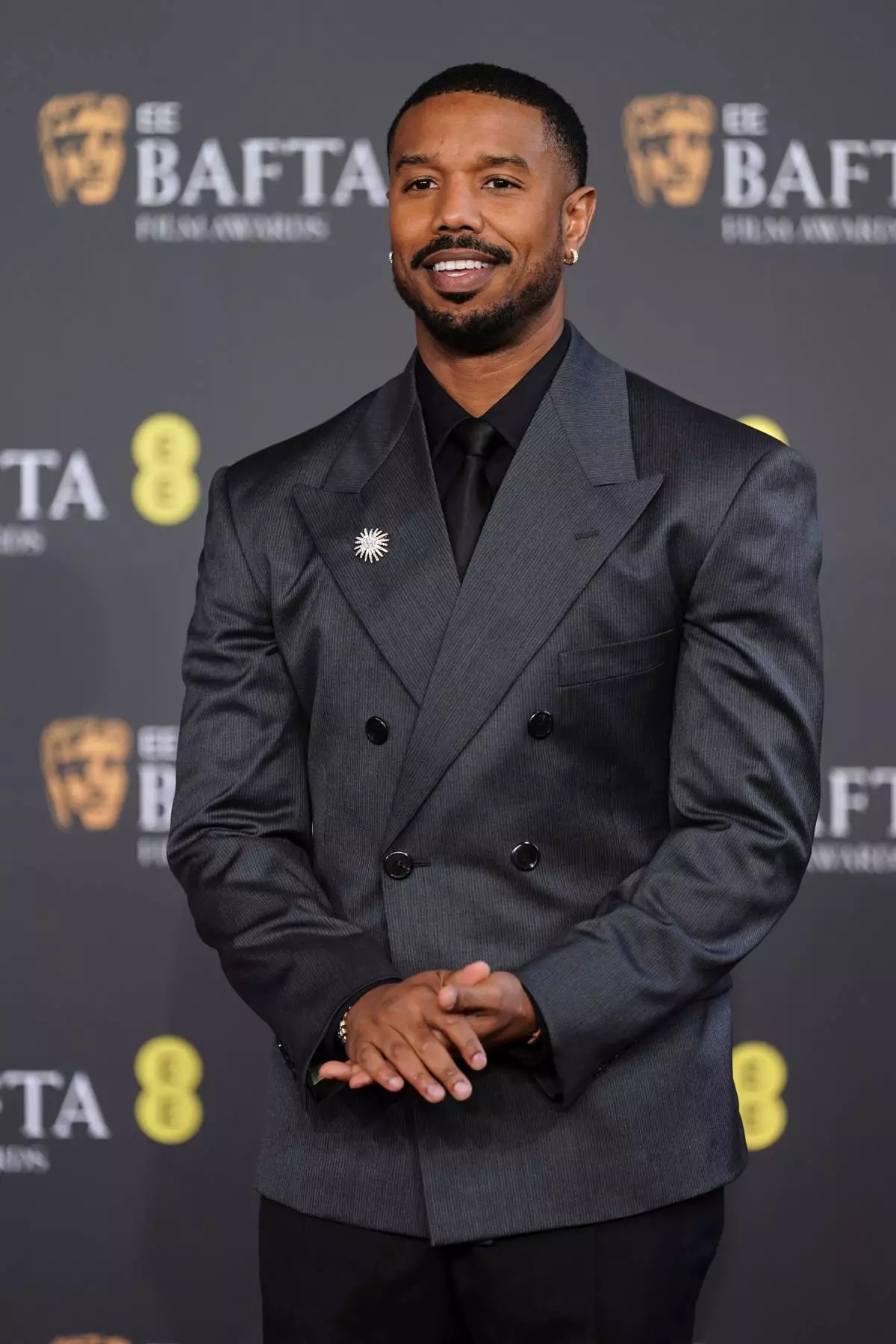 Michael B. Jordan poses for photographers upon arrival at the 79th British Academy Film Awards, BAFTA's, in London, Sunday, Feb. 22, 2026. (AP Photo/Alberto Pezzali)