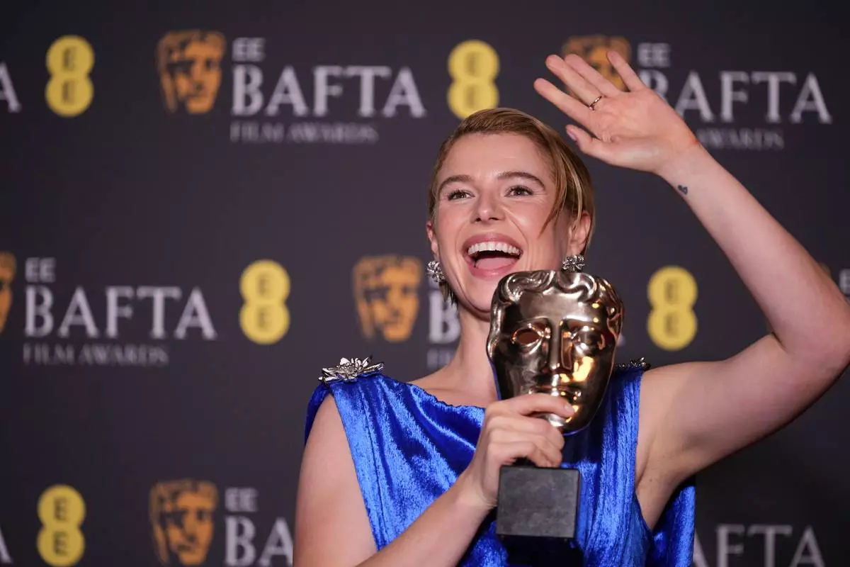 Jessie Buckley poses with the award for leading actress for 'Hamnet' at the 79th British Academy Film Awards, BAFTA's, in London, Sunday, Feb. 22, 2026. (AP Photo/Alastair Grant)