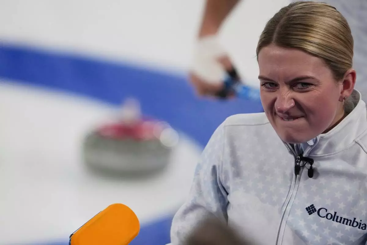 United States' Cory Thiesse dejects as she competes against Sweden during the gold medal mixed doubles curling match, at the 2026 Winter Olympics, in Cortina D'Ampezzo, Italy, Tuesday, Feb. 10, 2026. (AP Photo/Misper Apawu)
