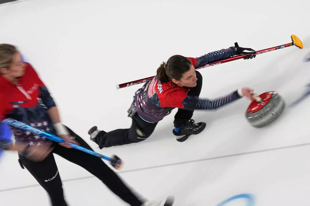 United States' Tabitha Peterson competes during a women's curling semifinal match against Switzerland, at the 2026 Winter Olympics, in Cortina d'Ampezzo, Italy, Friday, Feb. 20, 2026. (AP Photo/Fatima Shbair)