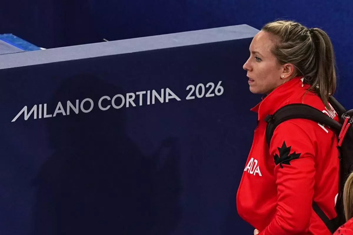 Canada's Rachel Homan leaves following a women's curling semifinal match against Sweden at the 2026 Winter Olympics, in Cortina d'Ampezzo, Italy, Friday, Feb. 20, 2026. (AP Photo/Fatima Shbair)