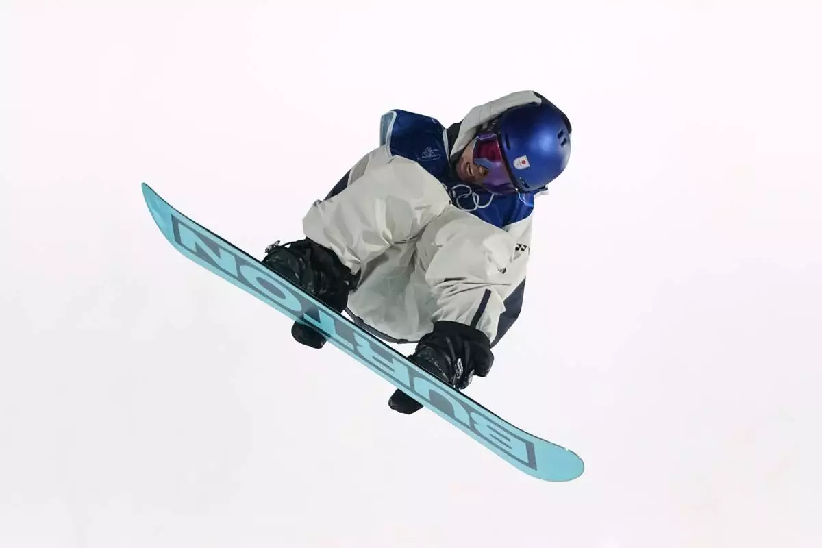 Japan's Hiroto Ogiwara competes in men's snowboard big air qualifications at the 2026 Winter Olympics, in Livigno, Italy, Thursday, Feb. 5, 2026. (AP Photo/Gregory Bull)