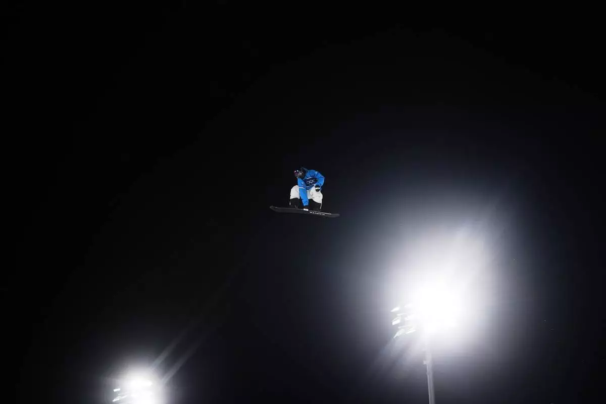 Italy's Ian Matteoli competes in men's snowboard big air qualifications at the 2026 Winter Olympics, in Livigno, Italy, Thursday, Feb. 5, 2026. (AP Photo/Lindsey Wasson)