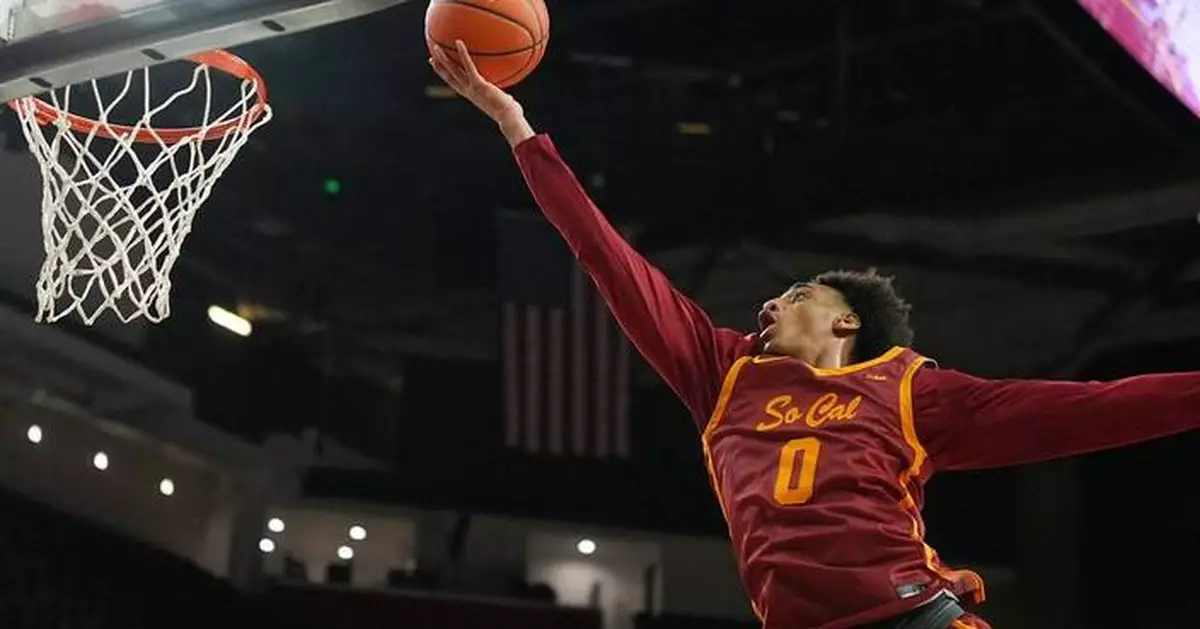 Evans scores 21 points and keys Oregon's 59-second, 7-0 run to stun USC 71-70