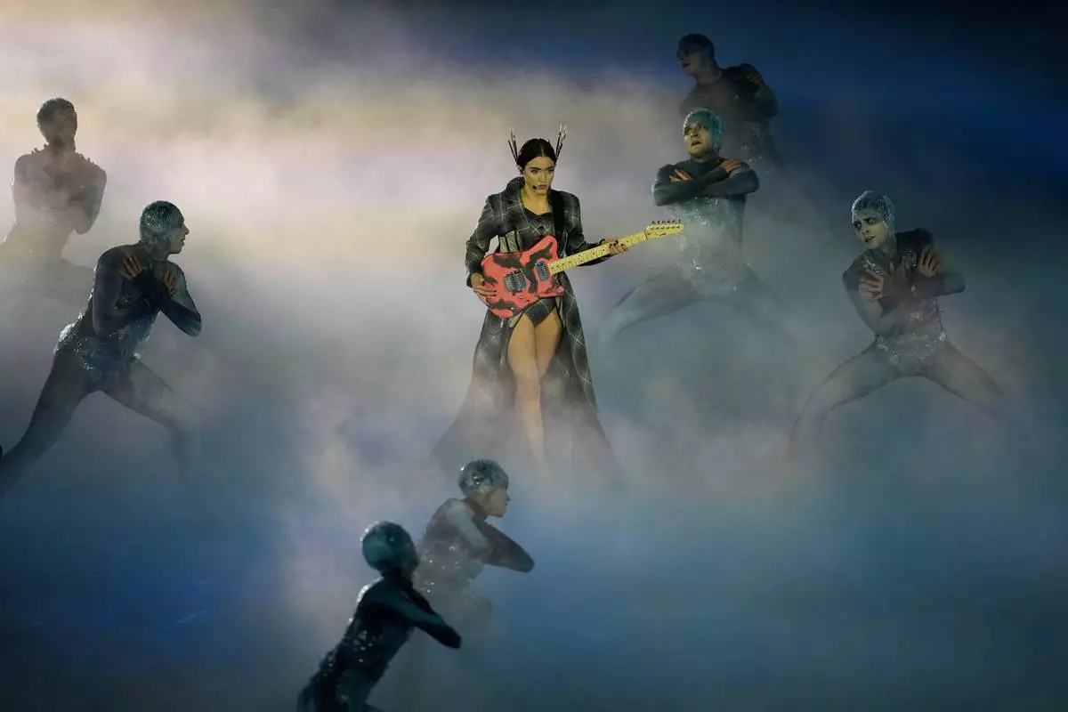 Singer Joan Thiele performs during the closing ceremony of the 2026 Winter Olympics, in Verona, Italy, Sunday, Feb. 22, 2026. (AP Photo/Ashley Landis)