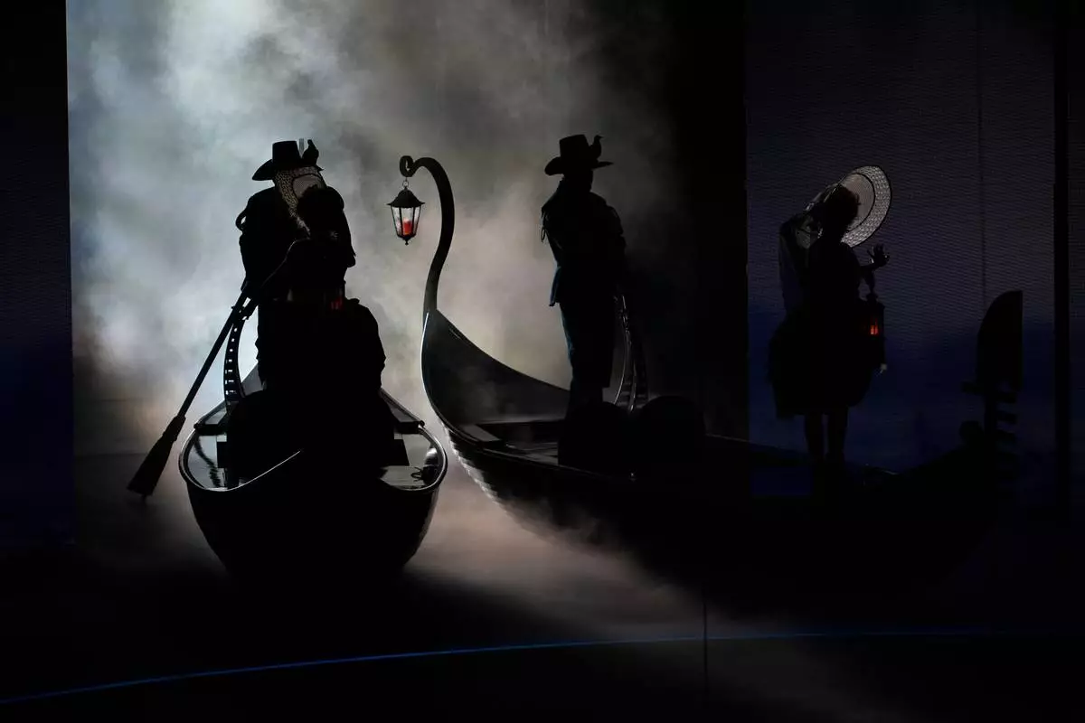 Artists perform during the closing ceremony of the 2026 Winter Olympics, in Verona, Italy, Sunday, Feb. 22, 2026. (AP Photo/Ashley Landis)