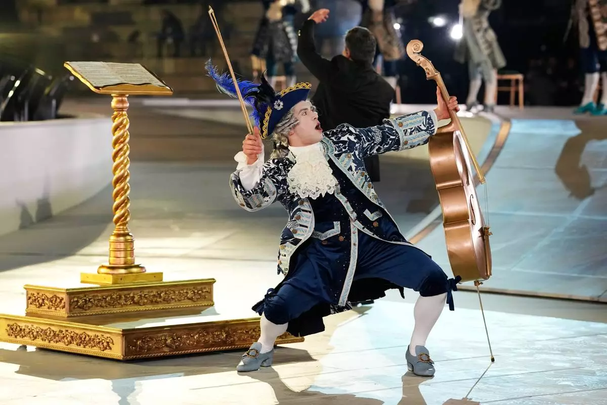 A performer participates in the closing ceremony of the 2026 Winter Olympics, in Verona, Italy, Sunday, Feb. 22, 2026. (AP Photo/Natacha Pisarenko)