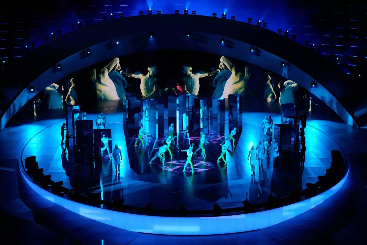 Artists perform during the closing ceremony of the 2026 Winter Olympics, in Verona, Italy, Sunday, Feb. 22, 2026. (AP Photo/Bernat Armangue)