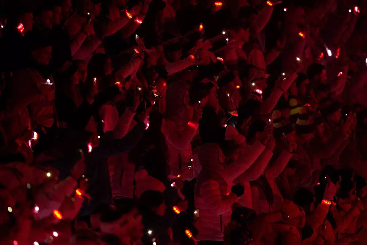 Athletes attend the closing ceremony of the 2026 Winter Olympics, in Verona, Italy, Sunday, Feb. 22, 2026. (AP Photo/Ashley Landis)