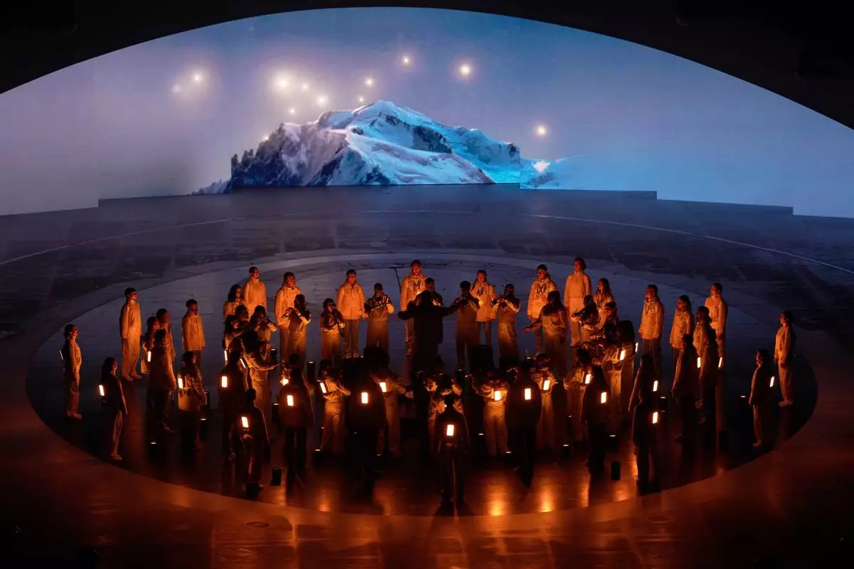 Artists perform during the closing ceremony of the 2026 Winter Olympics, in Verona, Italy, Sunday, Feb. 22, 2026. (AP Photo/Bernat Armangue)