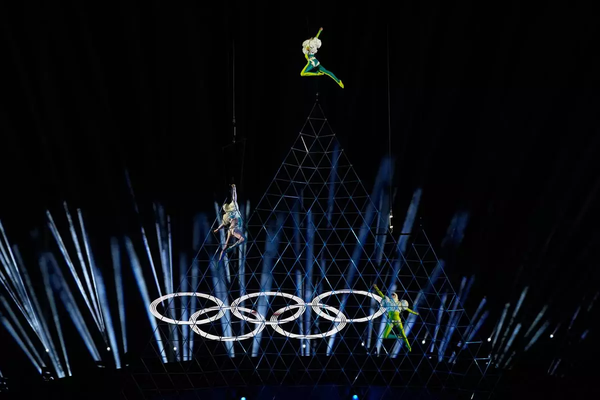 Performers participate in the closing ceremony of the 2026 Winter Olympics, in Verona, Italy, Sunday, Feb. 22, 2026. (AP Photo/Natacha Pisarenko)