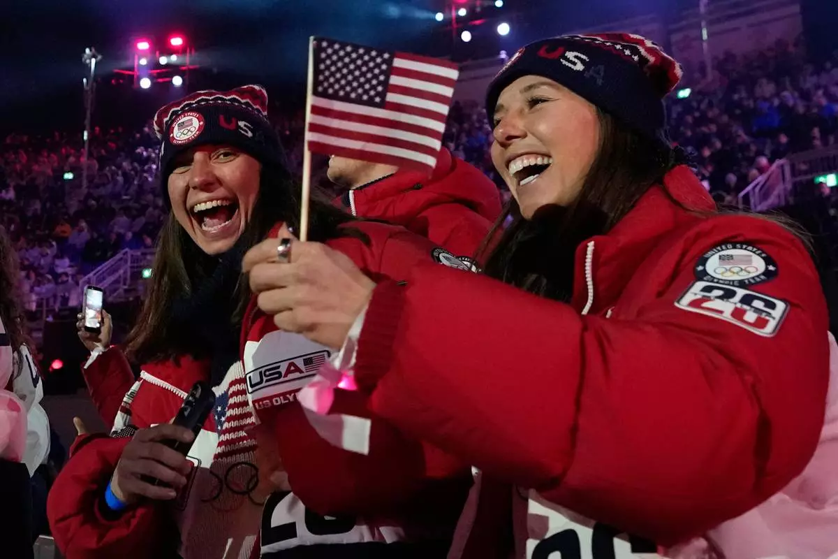 Athletes from the United States attend the closing ceremony of the 2026 Winter Olympics, in Verona, Italy, Sunday, Feb. 22, 2026. (AP Photo/Natacha Pisarenko)