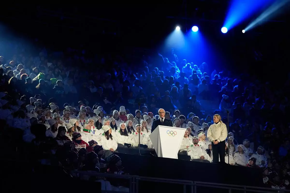 President of the Milan Cortina 2026 foundation Giovanni Malago speaks as IOC President Kirsty Coventry, right, stands nearby during the closing ceremony of the 2026 Winter Olympics, in Verona, Italy, Sunday, Feb. 22, 2026. (AP Photo/Natacha Pisarenko)