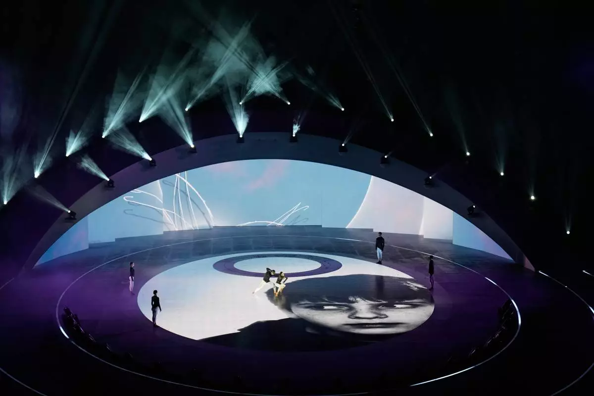 Artists perform during the closing ceremony of the 2026 Winter Olympics, in Verona, Italy, Sunday, Feb. 22, 2026. (AP Photo/Bernat Armangue)