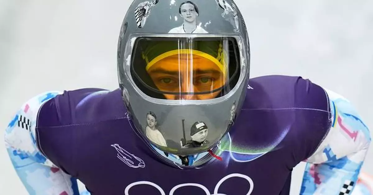 Ukrainian skeleton athlete Vladyslav Heraskevych trains again in banned helmet, despite IOC ruling