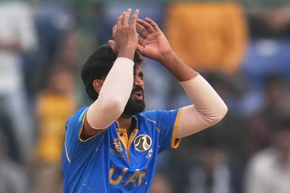United Arab Emirates' Muhammad Arfan reacts after bowls a delivery during the T20 World Cup cricket match between South Africa and United Arab Emirates in New Delhi, India, Wednesday, Feb. 18, 2026. (AP Photo/Manish Swarup)