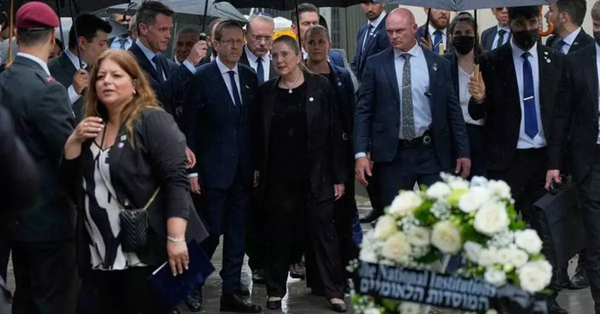 Israel's president visits Sydney's Bondi Beach massacre site and  meets victims' families