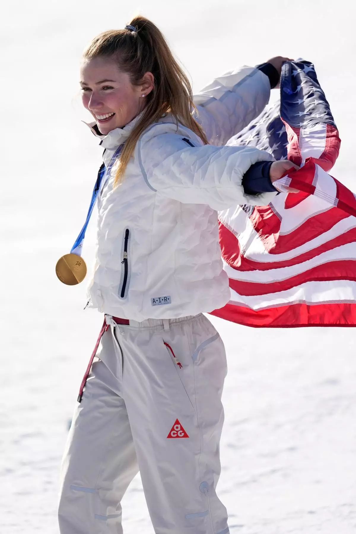 United States' Mikaela Shiffrin poses with the gold medal of the alpine ski, women's slalom race, at the 2026 Winter Olympics, in Cortina d'Ampezzo, Italy, Wednesday, Feb. 18, 2026. (AP Photo/Robert F. Bukaty)