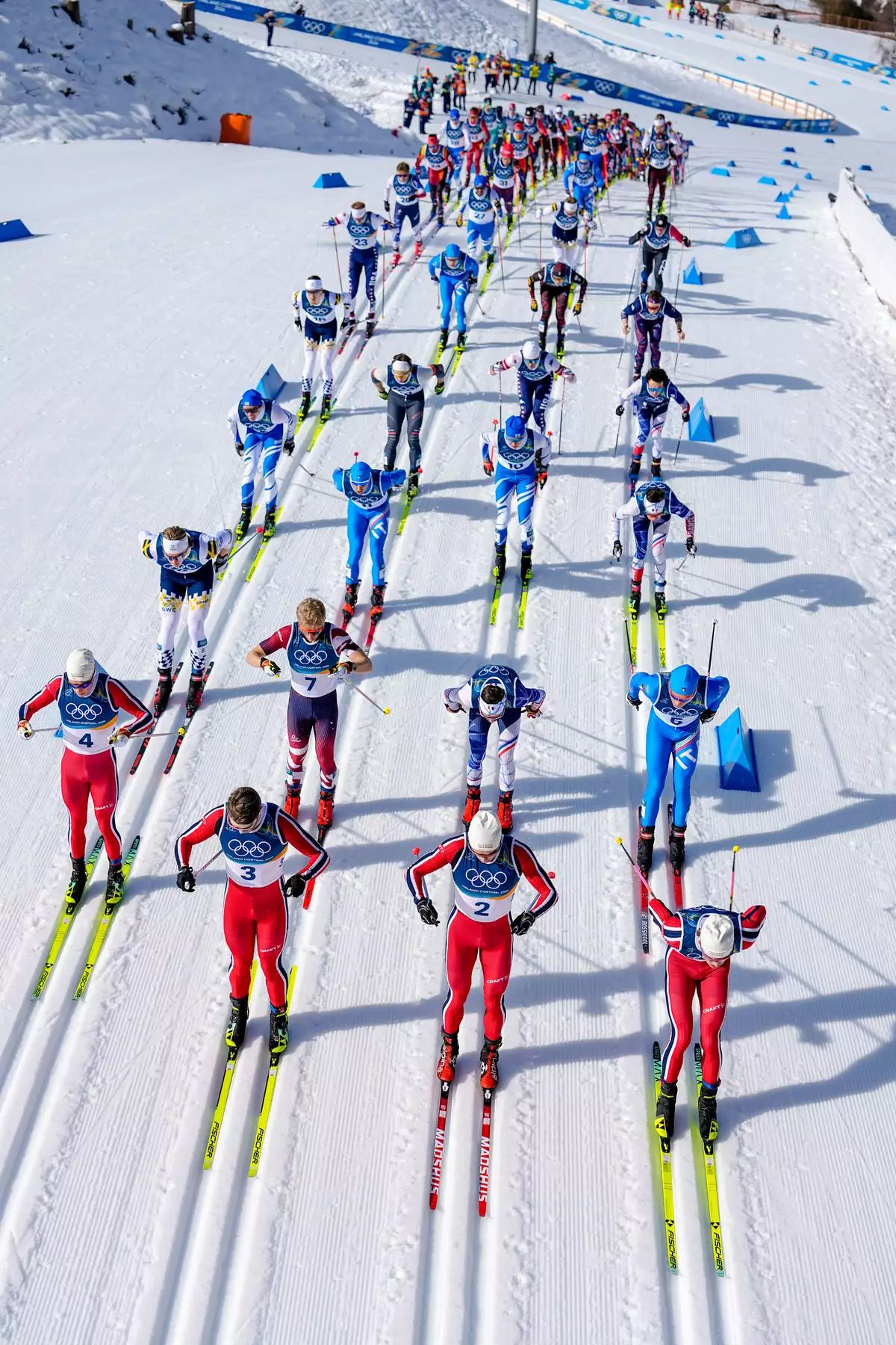 From right, Johannes Hoesflot Klaebo, Harald Oestberg Amundsen, Mattis Stenshagen and Martin Loewstroem Nyenget, all four of Norway, compete in the cross country skiing men's 10km + 10km skiathlon at the 2026 Winter Olympics, in Tesero, Italy, Sunday, Feb. 8, 2026. (AP Photo/Matthias Schrader)