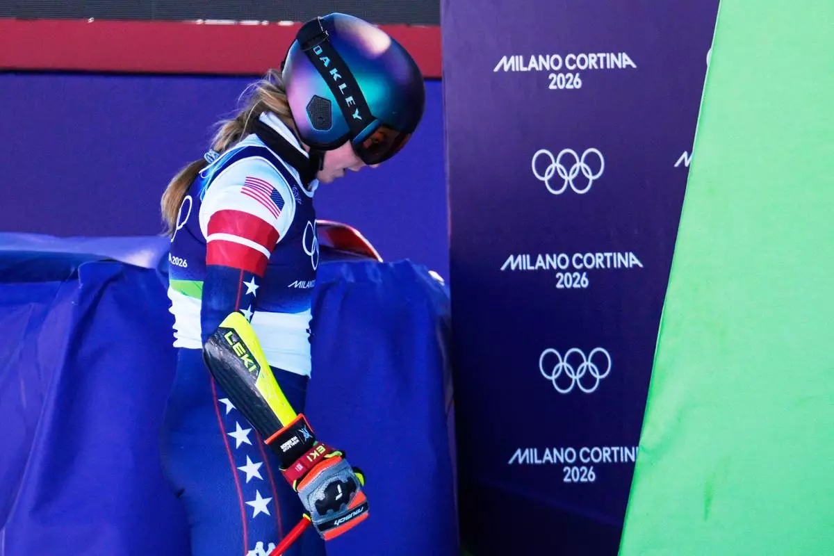 United States' Mikaela Shiffrin leaves the finish area during an alpine ski, women's giant slalom race, at the 2026 Winter Olympics, in Cortina d'Ampezzo, Italy, Sunday, Feb. 15, 2026. (AP Photo/Robert F. Bukaty)
