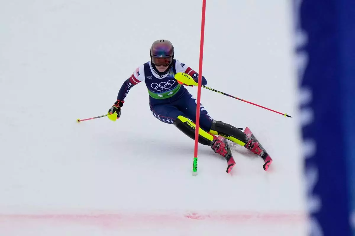 United States' Mikaela Shiffrin crosses the finish line of an alpine ski, women's team combined race, at the 2026 Winter Olympics, in Cortina d'Ampezzo, Italy, Tuesday, Feb. 10, 2026. (AP Photo/Andy Wong)