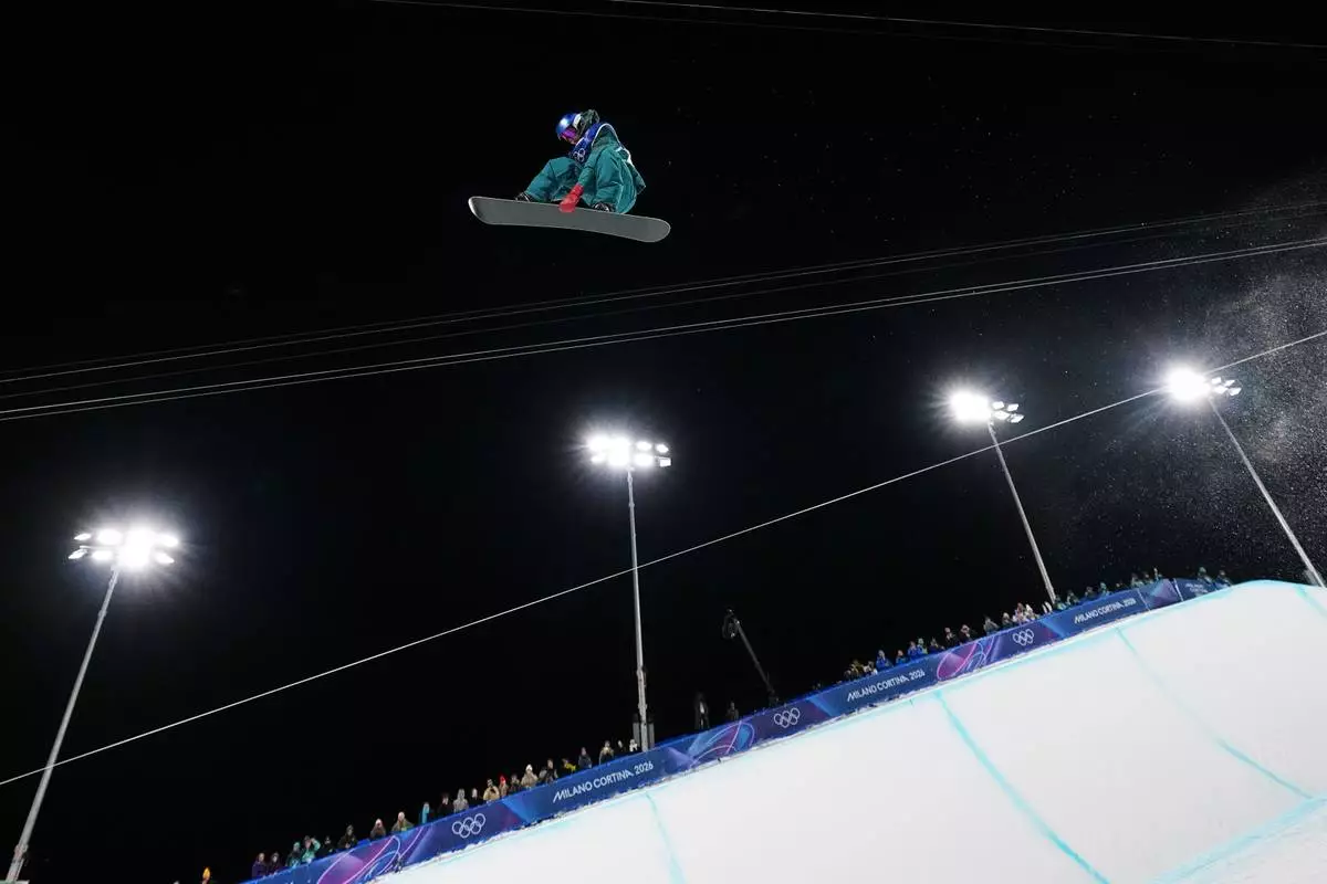 Australia's Scotty James competes during the men's snowboarding halfpipe qualifications at the 2026 Winter Olympics, in Livigno, Italy, Wednesday, Feb. 11, 2026. (AP Photo/Gregory Bull)